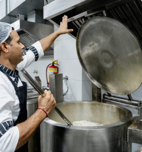 Large-scale meal preparation at Samya India community kitchen